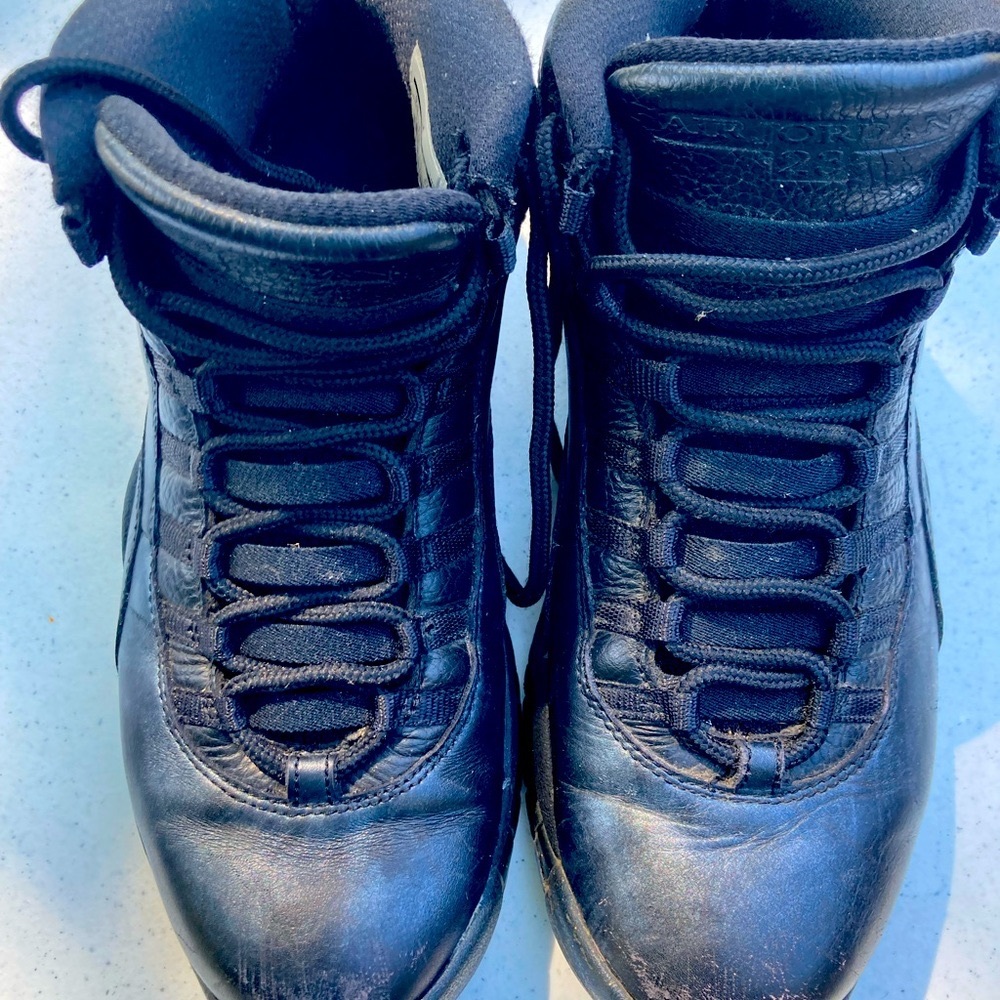 9.5 Black and gold NYC Jordan’s